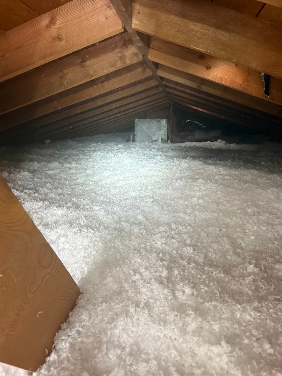 Blown-in attic insulation installation by Arizona Attic Pros